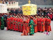 Performers wearing costumes of the Qing Dynasty (1644-1911) act during a performance presenting the ancient royal heaven worship ceremony in the Tiantan Park (Temple of Heaven) in Beijing, capital of China, Feb. 3, 2011, on the occasion of the Chinese Lunar New Year of Rabbit. The Temple of Heaven was first built in 1420 and was used to be the imperial sacrificial altar during the Ming (1368-1644) and Qing Dynasties. [Photo by Jia Yunlong]