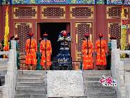 Performers wearing costumes of the Qing Dynasty (1644-1911) act during a performance presenting the ancient royal heaven worship ceremony in the Tiantan Park (Temple of Heaven) in Beijing, capital of China, Feb. 3, 2011, on the occasion of the Chinese Lunar New Year of Rabbit. The Temple of Heaven was first built in 1420 and was used to be the imperial sacrificial altar during the Ming (1368-1644) and Qing Dynasties. [Photo by Jia Yunlong]