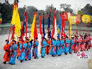 Performers wearing costumes of the Qing Dynasty (1644-1911) act during a performance presenting the ancient royal heaven worship ceremony in the Tiantan Park (Temple of Heaven) in Beijing, capital of China, Feb. 3, 2011, on the occasion of the Chinese Lunar New Year of Rabbit. The Temple of Heaven was first built in 1420 and was used to be the imperial sacrificial altar during the Ming (1368-1644) and Qing Dynasties. [Photo by Jia Yunlong]