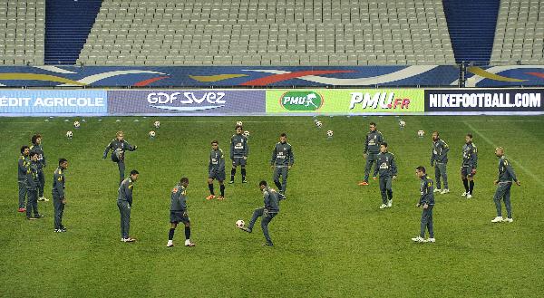 Brazil's national soccer team trains on the pitch on the eve of their international friendly match against France at the Stade de France stadium in Saint-Denis, near Paris February 8, 2011. 