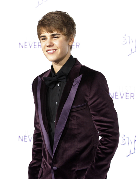 Singer Justin Bieber poses at the premiere of the documentary 'Justin Bieber: Never Say Never' at Nokia theatre in Los Angeles February 8, 2011. The documentary opens in the U.S. on February 11. 