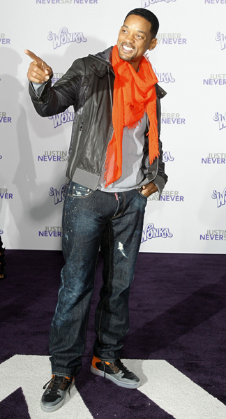 Actor Will Smith gestures at the premiere of the documentary 'Justin Bieber: Never Say Never' at Nokia theatre in Los Angeles February 8, 2011. The documentary opens in the U.S. on February 11. 