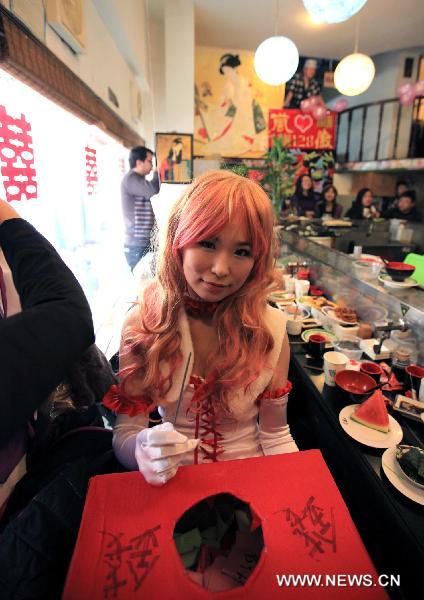 A girl in cosplay costume is seen during a wedding ceremony in the theme of cosplay in Hefei, east China&apos;s Anhui Province, Feb. 8, 2011. [Xinhua]