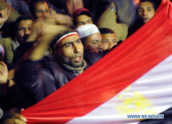Egyptians continue their protest demanding that Egyptian President Hosni Mubarak step down after listening to his speech at Tahrir Square in Cairo, capital of Egypt, Feb. 10, 2011. [Xinhua]
