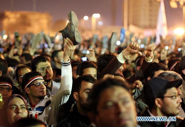 Egyptians continue their protest demanding that Egyptian President Hosni Mubarak step down after listening to his speech at Tahrir Square in Cairo, capital of Egypt, Feb. 10, 2011. [Xinhua]