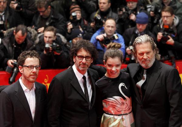 The cast of 'True Grit,' Ethan Coen, Joel Coen, Hailee Steinfeld and Jeff Bridges, from left, of the opening movie of the 61st International Film Festival Berlinale pose during the opening of the 61st International Film Festival Berlinale in Berlin, Germany, Feb. 10, 2011.