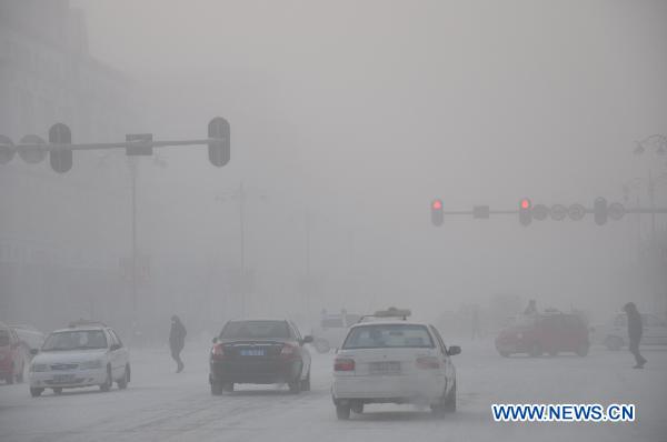 Photo taken on Feb. 10, 2011 shows a fog-covered road in Yakeshi city, north China&apos;s Inner Mongolia Autonomous Region. Temperature in the city dropped to minus 40.5 degrees centigrade on Thursday in the wake of strong cold snaps.