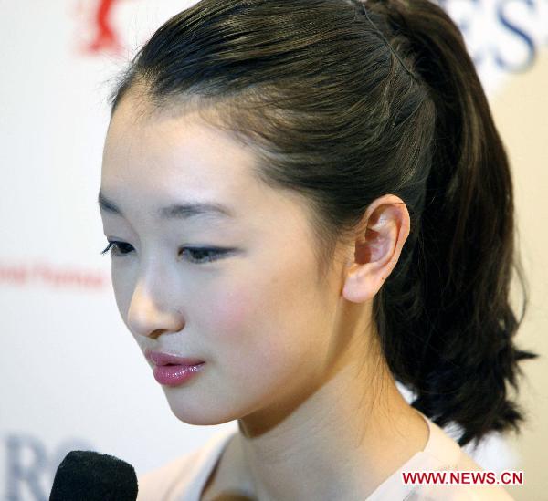 Actress Zhou Dongyu from Chinese film 'Under the Hawthorn Tree' is seen during an interview at Berlin Film Festival in Germany, Feb. 11, 2011.