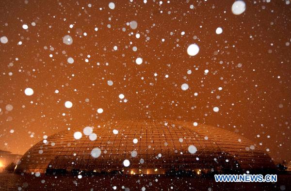 Photo taken on Feb. 13, 2011 shows National Centre for the Performing Arts in snowfall in Beijng, capital of China. Beijing embraced the second snowfall this winter since Saturday night.