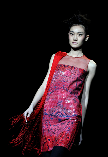 Rolling out her Fall 2011 Collection on the catwalk at Lincoln Center on Saturday, China-born designer Vivienne Tam dazzled this February's New York Fashion Week goers with a fascinating presentation of Chinese aesthetic charm.