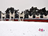 The Temple of Heaven, located in southeastern central Beijing, is China's largest existing complex of ancient ceremonial buildings. After its completion in 1420, some 22 emperors conducted splendid sacrificial rituals here. Qiniandian (Hall of Prayer for Good Harvests) has become a world-famous symbol of Beijing City.  [Photo by Liu Yi]
