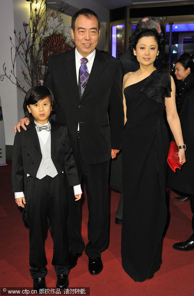 Chinese director Chen Kaige (center), his wife Chen Hong, and child actor William Wang promote the film 'Sacrifice' during the 61st Berlin International Film Festival in Berlin, Germany on Monday, February 14, 2011.