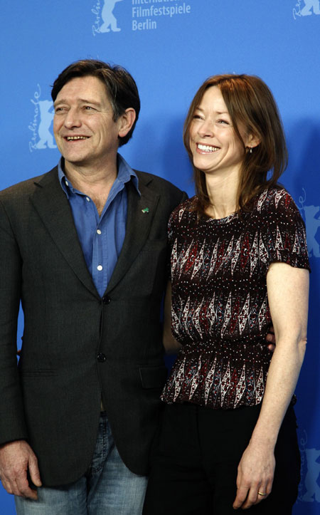 Actors Pierre Bokma and Jenny Schily, daughter of former German Interior Minister Otto Schily, pose during a photocall to promote the movie 'Schlafkrankheit' (Sleeping Sickness) at the 61st Berlinale International Film Festival in Berlin February 12, 2011. The Berlinale International Film Festival runs from February 10 to 20, 2011.