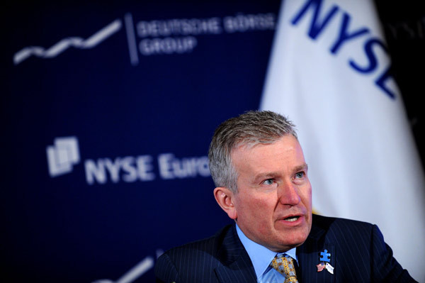 NYSE Chief Executive Officer Duncan Niederauer speaks during a news conference at the New York Stock Exchange in New York, the United States, Feb. 15, 2011. NYSE Euronext and Germany's Deutsche Boerse announced on Tuesday that they had reached a final agreement on business combination to form the biggest exchange operator in the world.[Xinhua]