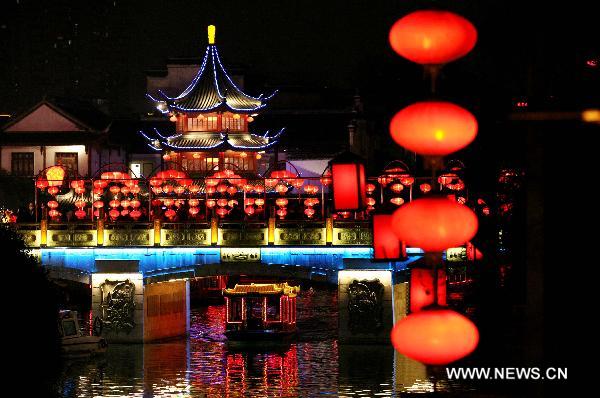 Photo taken on Feb. 15, 2011 shows colorful lanterns at the Confucius Temple scenic area in Nanjing, capital of east China's Jiangsu Province. Lanterns were lit at the area to celebrate the upcoming Lantern Festival that falls on Feb. 17, 2011. [Wang Xin/Xinhua]