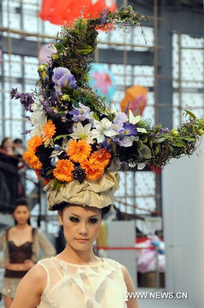 A model presents a fashion creation during the 2011 FUSE Fashion Festival in Taipei, southeast China's Taiwan, Feb. 16, 2011. The 33-day fashion event kicked off here Wednesday, to highlight designs by fashion students at a dozen of Taiwan's colleges.