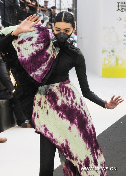 A model presents a fashion creation during the 2011 FUSE Fashion Festival in Taipei, southeast China's Taiwan, Feb. 16, 2011. The 33-day fashion event kicked off here Wednesday, to highlight designs by fashion students at a dozen of Taiwan's colleges.