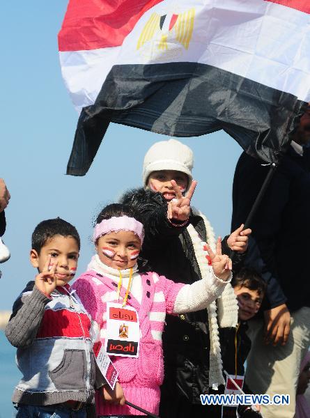 Egyptian pro-democracy supporters gather in front of Leader Ibrahim mosque in Alexandria, Egypt, Feb. 18, 2011. 