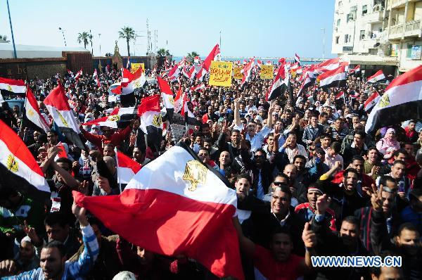 Egyptian pro-democracy supporters gather in front of Leader Ibrahim mosque in Alexandria, Egypt, Feb. 18, 2011. 