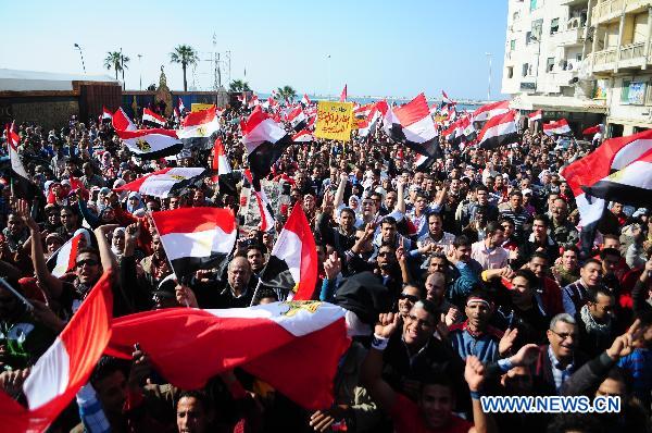 Egyptian pro-democracy supporters gather in front of Leader Ibrahim mosque in Alexandria, Egypt, Feb. 18, 2011. 