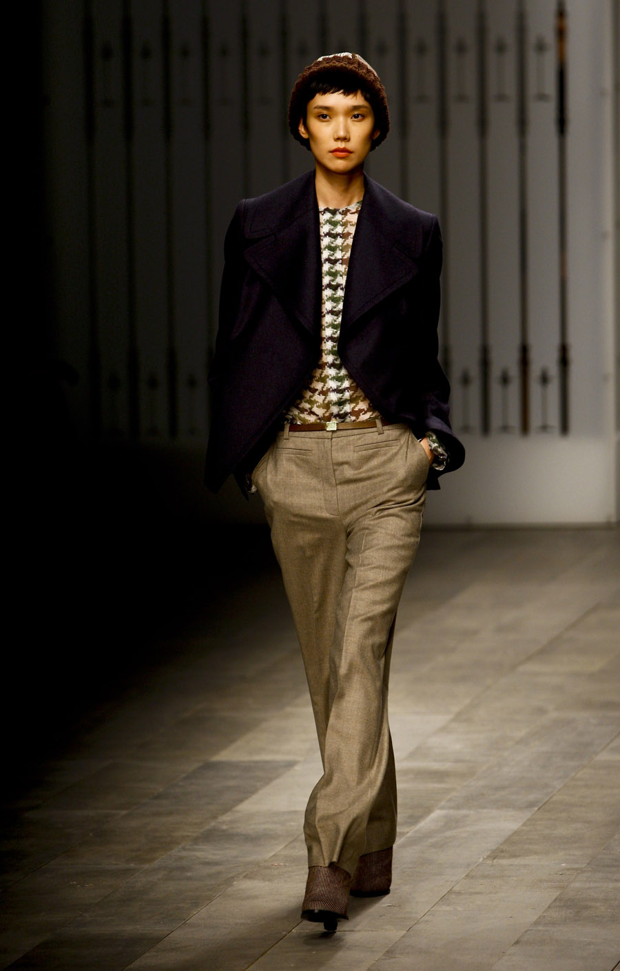 A model presents a new creation of British Brand Jaeger London on the second day of the London Fashion Week in London, Britain, Feb. 19, 2011. The London Fashion Week Autumn/Winter 2011 collections last from Feb 18 to 23. [Xinhua] 