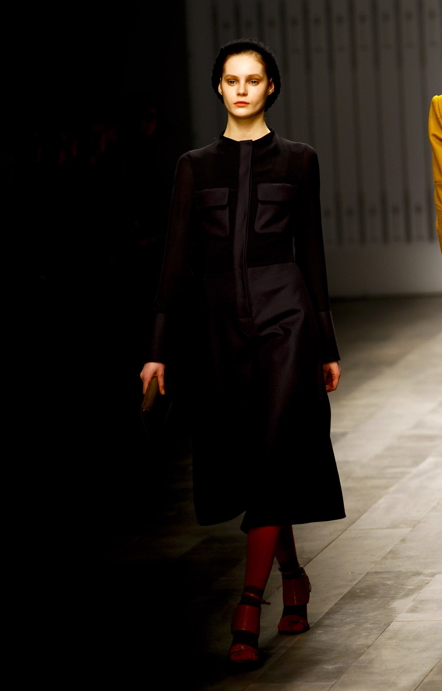 A model presents a new creation of British Brand Jaeger London on the second day of the London Fashion Week in London, Britain, Feb. 19, 2011. The London Fashion Week Autumn/Winter 2011 collections last from Feb 18 to 23. [Xinhua] 