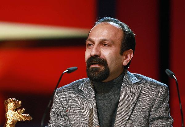  Iranian Director Asghar Farhadi speaks after being presented with the Golden Bear award for Best Film during the awards ceremony at the 61st Berlinale International Film Festival in Berlin, Feb. 19, 2011. [Xinhua]