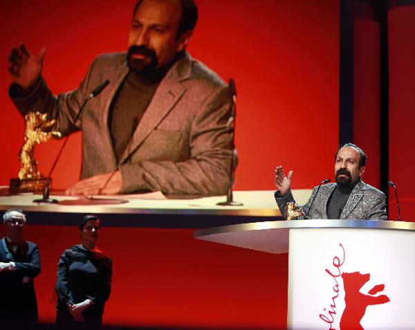 Iranian Director Asghar Farhadi speaks after being presented with the Golden Bear award for Best Film during the awards ceremony at the 61st Berlinale International Film Festival in Berlin, Feb. 19, 2011. [Xinhua]