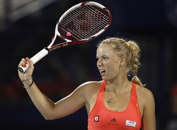 Caroline Wozniacki of Denmark reacts during her final match against Svetlana Kuznetsova of Russia at the WTA Dubai Tennis Championships February 20, 2011. (Xinhua/Reuters Photo) 