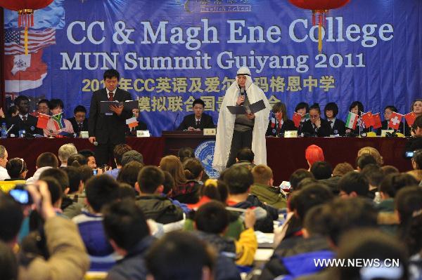 Students from China and Ireland participate in a simulative activity of Model United Nations in Guiyang, southwest China's Guizhou Province, Feb. 20, 2011. A Guizhou-Ireland Youth Culture Week was held from Feb. 16 through Feb. 23, during which twenty-two Irish youngsters experienced the ordinary Chinese daily life, culture and other activities. 
