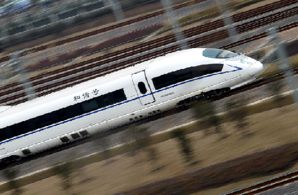 A high speed train leaves Shanghai Hongqiao railway station for a test run in Shanghai, east China's Shanghai, Feb. 20, 2011. The Beijing-Shanghai high speed railway started a test run on its Shanghai section on Sunday. The Beijing-Shanghai high speed rail service provides a four-hour link between the twin cosmopolitan cities in China once fully in operation late 2011. Preparations have been made for a test run which will be lauched soon. [Xinhua/Chen Fei] 