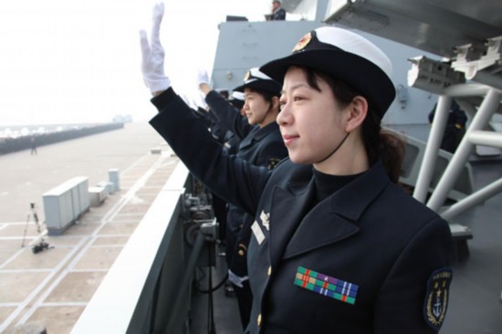 Sailors sent out to the Gulf of Aden for the eighth anti-piracy mission wave goodbye aboard a missile frigate in Zhoushan, East China's Zhejiang province, Feb 21, 2011. [Xinhua]