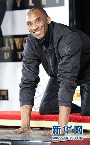 Los Angeles Lakers guard Kobe Bryant has become the first athlete ever to be immortalized at Grauman's Chinese Theater, the Hollywood movie industry landmark.