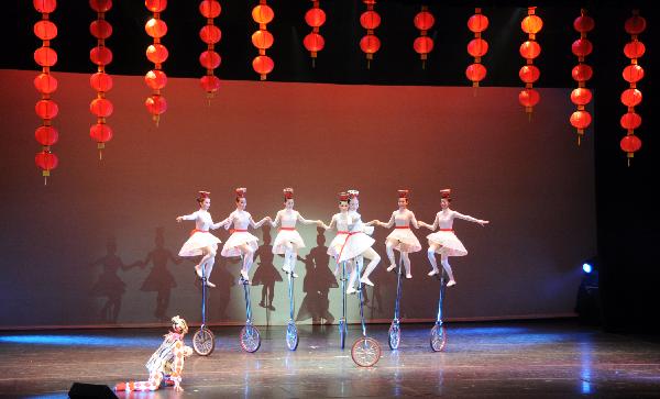 Chinese acrobats perform on the grand show titled 'Cultures of China, Festival of Spring' during its special global art tour in Washington, capital of the United States, on Feb. 21, 2011.