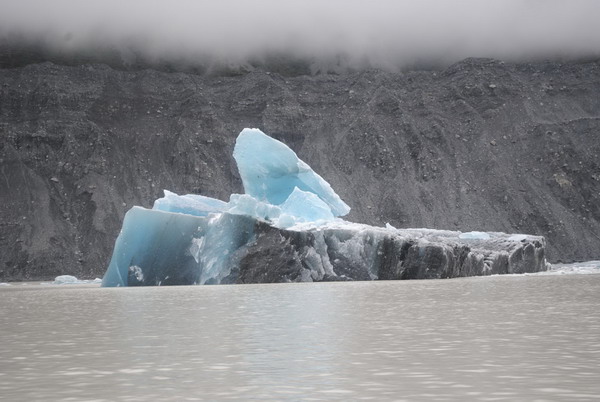 An iceberg, broken off from the glacier after Tuesday's earthquake, is seen in the Tasman Lake, 200km (124 miles) southeast of Christchurch in this handout photograph released Feb 23, 2011.