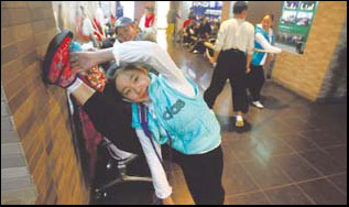 Applicants for the Central Academy of Drama's Peking Opera major warm up before auditions. (Photo: China Daily)