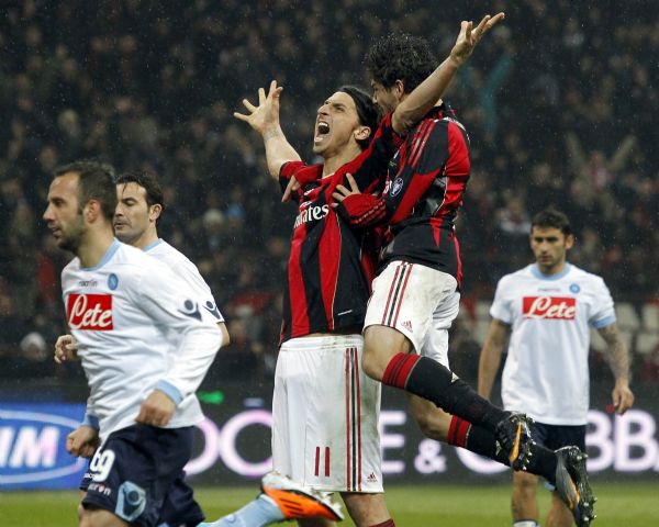 AC Milan's Ibrahimovic celebrates with his team mate Pato after scoring against Napoli during their Italian Serie A soccer match in Milan. AC Milan's Zlatan Ibrahimovic (C) celebrates with his team mate Pato after scoring against Napoli during their Italian Serie A soccer match at the San Siro stadium in Milan February 28, 2011. (Xinhua/Reuters)