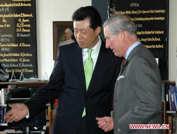 Charles (R), Prince of Wales, and Chinese Ambassador to the United Kingdom Liu Xiaoming attend the opening of the Confucius Classroom at the Llandovery College in Wales, Britain, March 1, 2011.