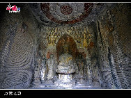 The Longmen Grottoes, located near Luoyang, Henan Province, are a treasure house of ancient Buddhist cave art. The grottos were hewed and carved during the Northern Wei Dynasty (386-534), when the rulers relocated their capital at Luoyang near the end of the 5th century. The construction of the Longmen Grottoes began in 493 during the reign of Emperor Xiaowen and continued through the successive six dynasties, including Tang and Song, for a span of over 400 years.  [Courtesy of Longmen Grottoes Scenic Spot]