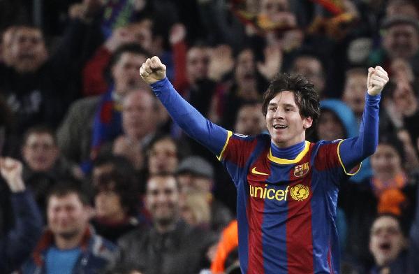 Barcelona's Lionel Messi celebrates after scoring a goal during their Champions League soccer match at Nou Camp stadium in Barcelona March 8, 2011. (Xinhua/Reuters Photo)
