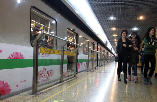 Women ride the first pink subway