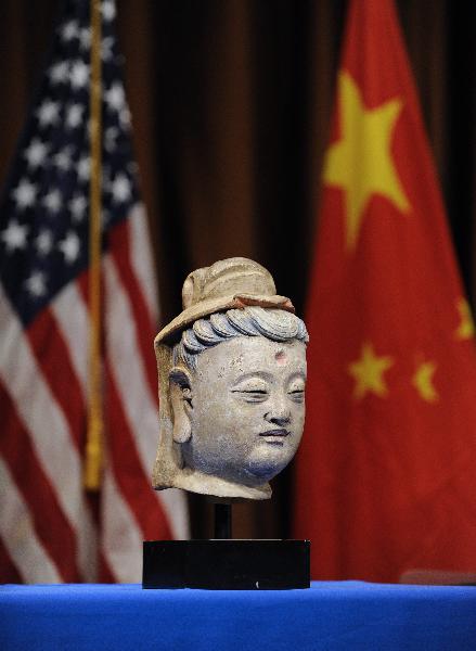 A China's Song Dynasty Bodhisattva head is presented during an ancient Chinese artifacts returning ceremony in Washington D.C., capital of the United States, March 11, 2011. 