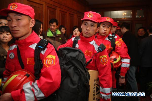 Members of the China's International Rescue Team gather at Beijing Capital International Airport in Beijing, capital of China, March 13, 2011. [Xinhua]