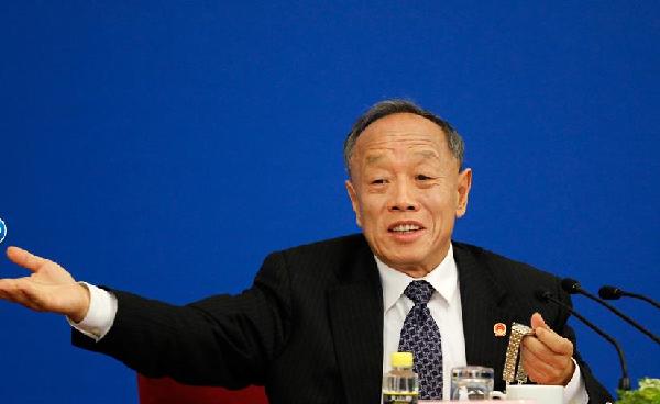 Li Zhaoxing, the spokesman of the fourth session of the 11th National People's Congress (NPC)