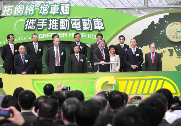 Hong Kong Special Administrative Region (SAR)'s Financial Secretary John C Tsang (Front) attends an electric vehicle (EV) publicity event in Hong Kong, south China, March 15, 2011. [Xinhua]