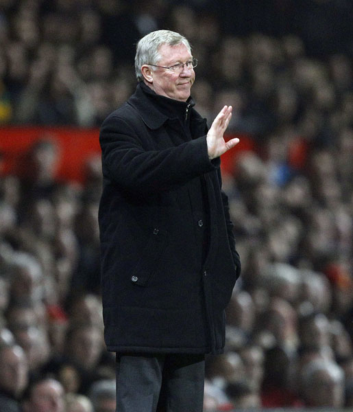 Manchester United's manager Alex Ferguson gestures during their second leg round of sixteen Champions League soccer match against Olympique Marseille at Old Trafford in Manchester, northern England, March 15, 2011. (Xinhua/Reuters Photo) 