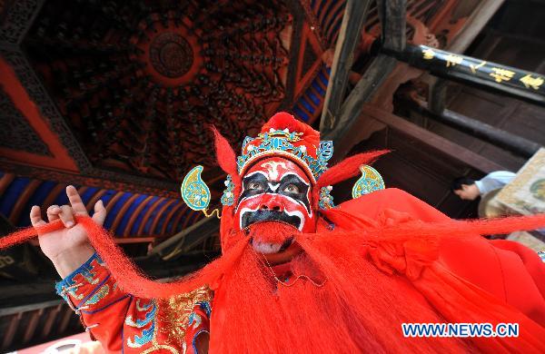 An actor performs the Mulian Opera in Xinchang County, east China's Zhejiang Province, March 14, 2011. 