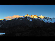 Ranwu Lake is called 'the Tibetan Switzerland.' The lake is set more than 3,800 meters above sea level and has an area of 22,000 square km. The seasons dictate the water's color, which ranges from aquamarine to turquoise. When the sun rises, the lake looks like a mirror reflecting snow-capped mountains, white clouds and the surrounding forest.[KingzenQue/forums.nphoto.net]