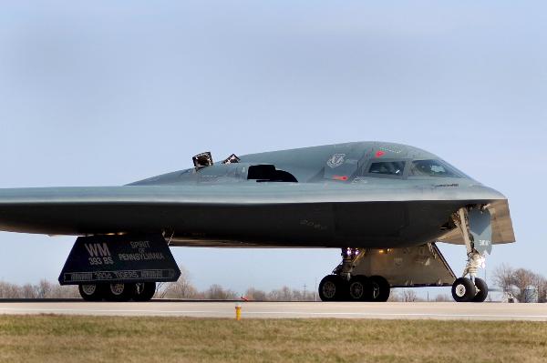 One of three Air Force Global Strike Command B-2 Spirit bombers returns to home base at Whiteman Air Force Base in Missouri, March 20, 2011 after striking targets in support of the international response which is enforcing a no-fly zone over Libya. The B-2s landed at Whiteman Air Force Base, Missouri after a more than 25-hour mission in support of Operation Odyssey Dawn. The bombers employed 45 guided Joint Direct Attack Munitions, each weighing 2,000 pounds. [Xinhua] 
