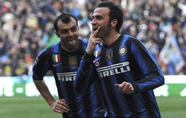 Inter Milan's Giampaolo Pazzini (R) celebrates with his teammate Goran Pandev after scoring against Lecce in their Italian Serie A soccer match at San Siro stadium in Milan March 20, 2011. (Xinhua/Reuters Photo) 